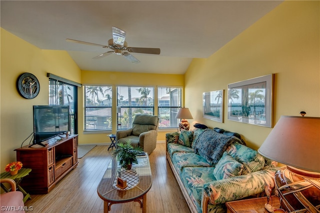 interior space featuring vaulted ceiling and ceiling fan