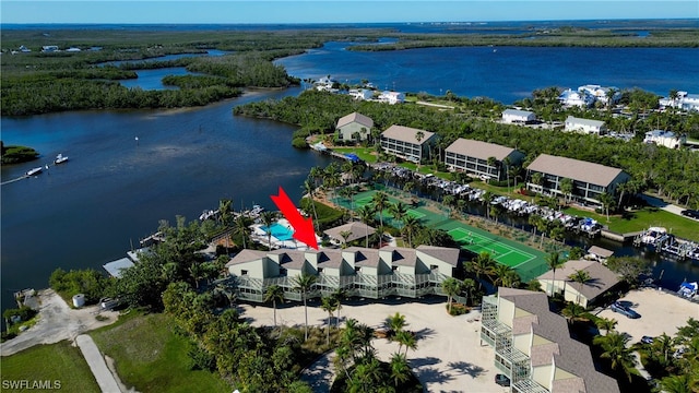 birds eye view of property featuring a water view