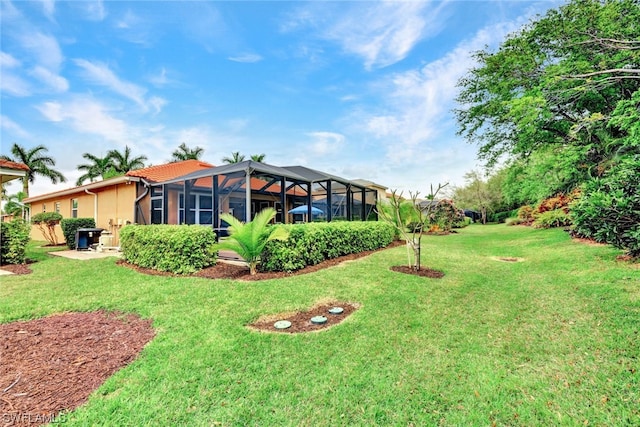 view of yard with a lanai