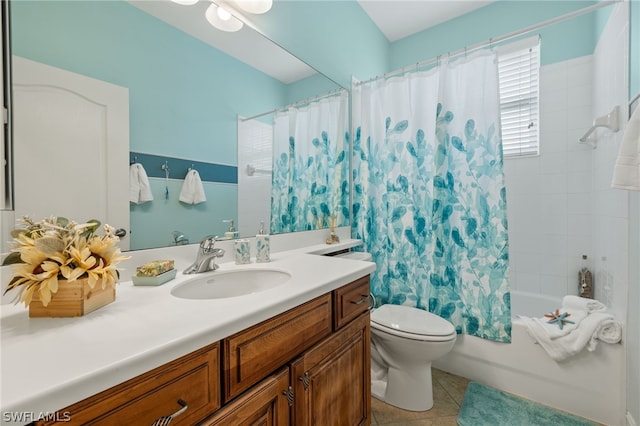 full bathroom featuring vanity, tile patterned floors, toilet, and shower / bath combo