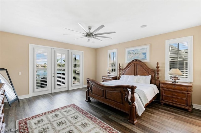 bedroom with a ceiling fan, access to outside, baseboards, and wood finished floors