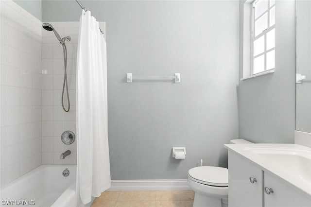 full bathroom with toilet, shower / tub combo, vanity, tile patterned flooring, and baseboards