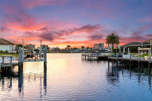 view of dock with a water view and boat lift