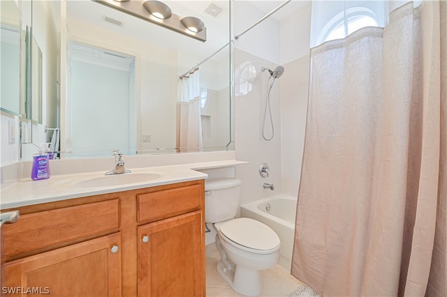 full bathroom featuring shower / bath combo with shower curtain, toilet, tile floors, and vanity