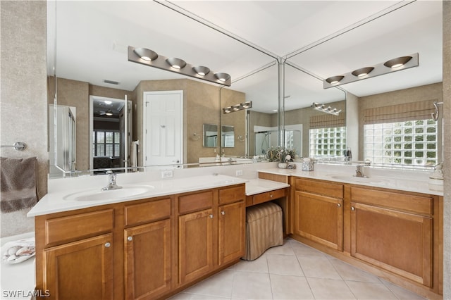 bathroom featuring dual vanity and tile floors