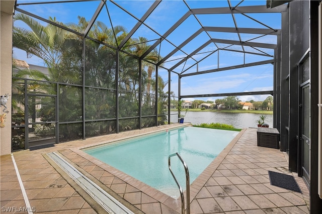 view of pool with a water view, a lanai, and a patio area