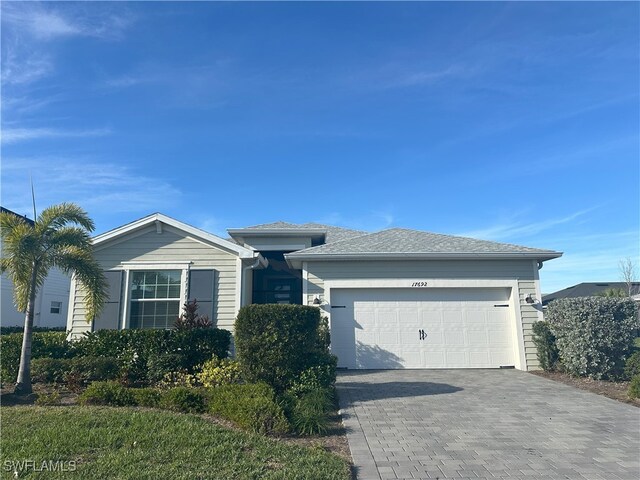 view of front of property with a garage