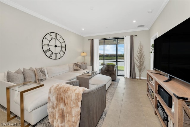 living room featuring ornamental molding and light tile floors