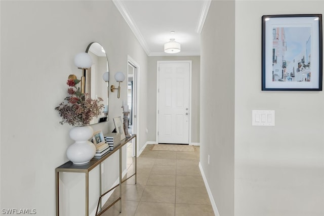 hall featuring ornamental molding and light tile floors