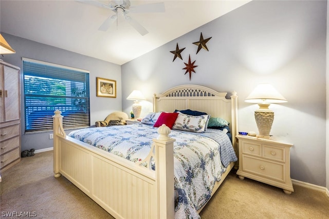 bedroom with light carpet and ceiling fan