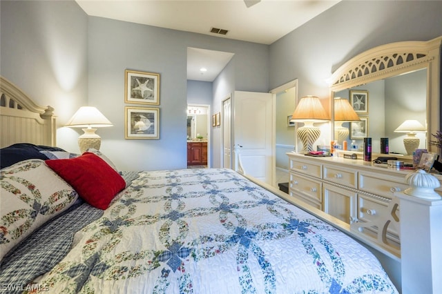 bedroom featuring ensuite bathroom