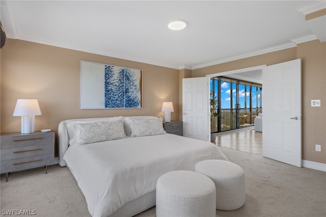 bedroom with ornamental molding, access to exterior, and light colored carpet