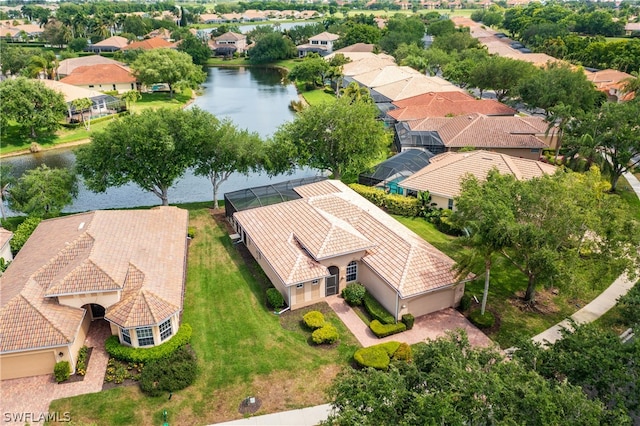 bird's eye view with a water view