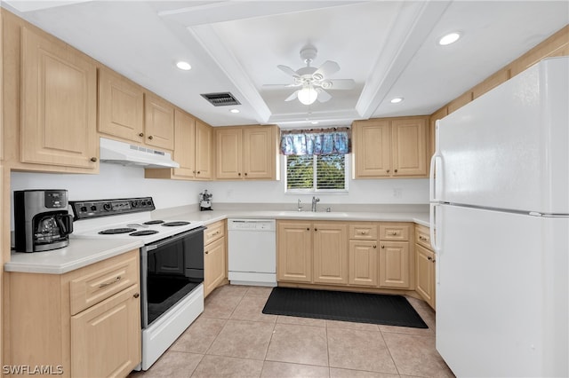 kitchen featuring ceiling fan, light brown cabinets, light tile patterned flooring, white appliances, and a tray ceiling