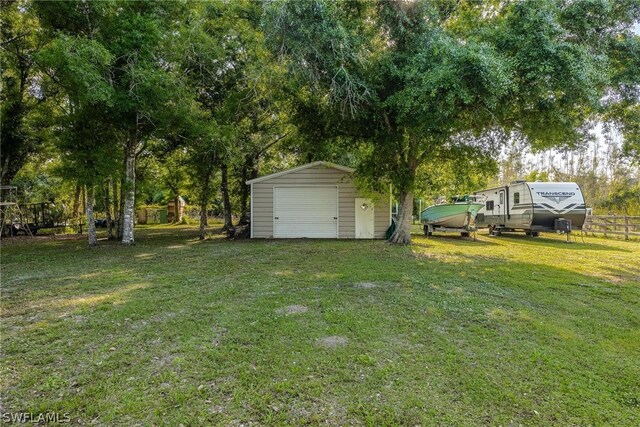 view of yard with an outdoor structure