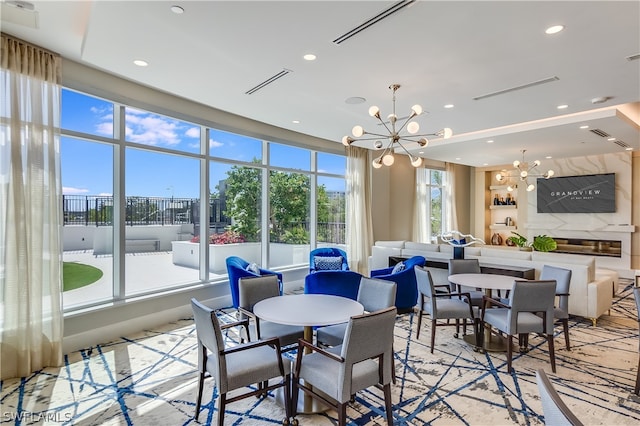 dining space with a notable chandelier