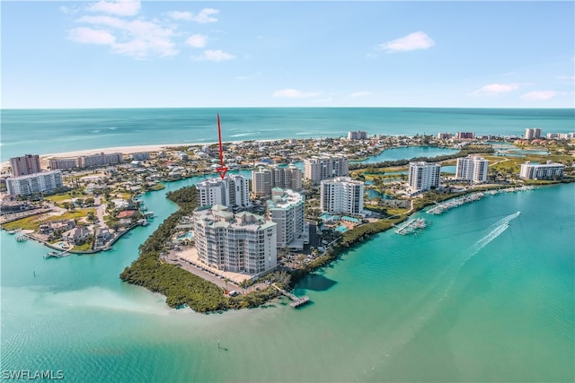 drone / aerial view with a water view