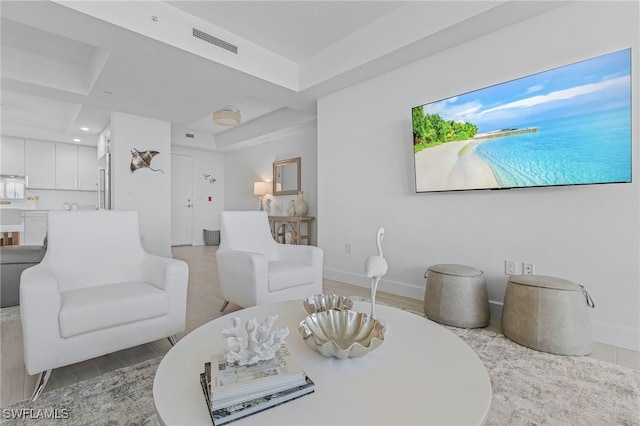 living room with light hardwood / wood-style floors