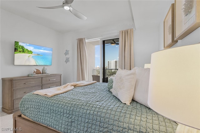 carpeted bedroom with access to exterior and ceiling fan