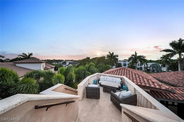 patio terrace at dusk with outdoor lounge area