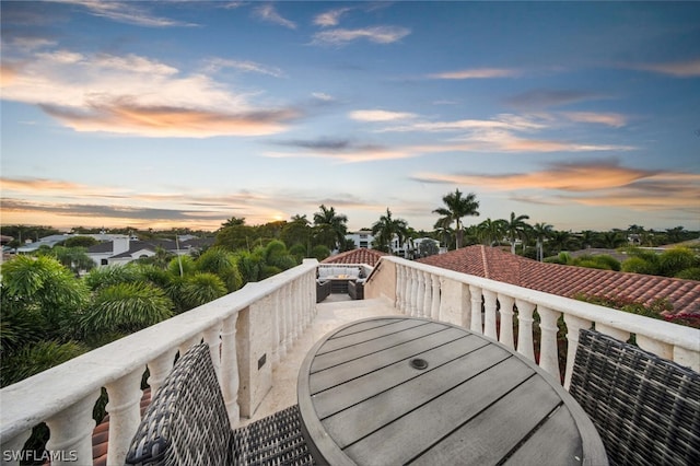 view of balcony at dusk