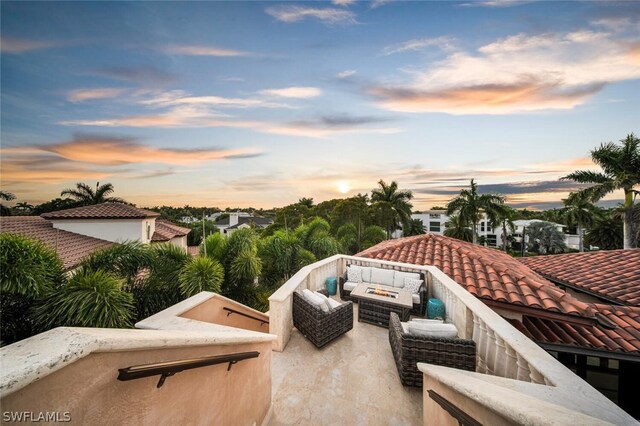 patio terrace at dusk with outdoor lounge area