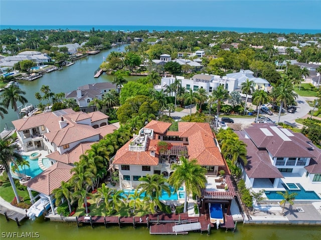 bird's eye view with a water view