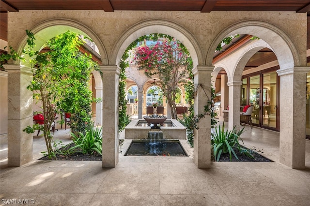 view of patio featuring french doors