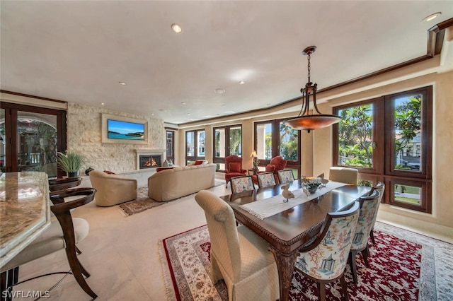 dining room featuring crown molding