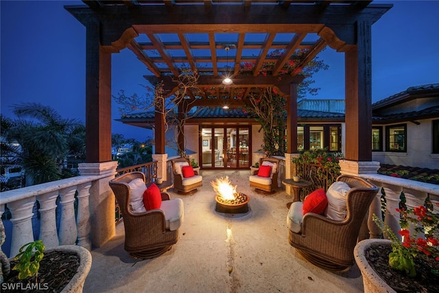 view of patio featuring a fire pit and a pergola