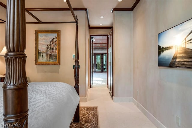 carpeted bedroom with crown molding