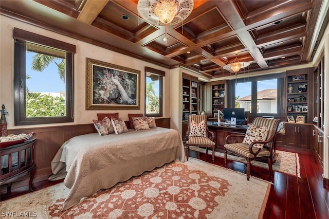 bedroom with multiple windows, hardwood / wood-style floors, and coffered ceiling