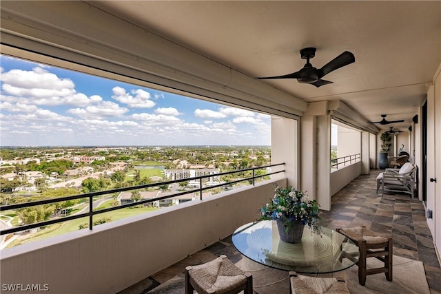 balcony featuring ceiling fan