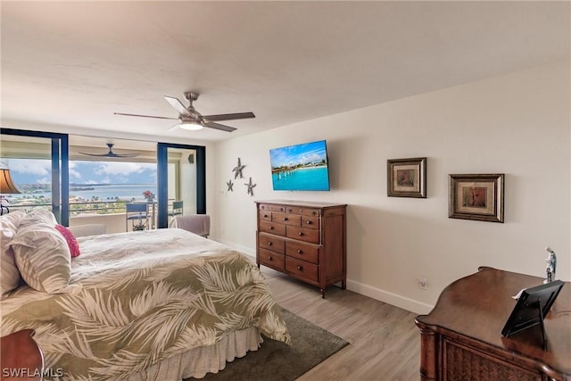 bedroom featuring ceiling fan and light wood-type flooring