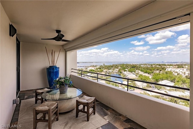 balcony featuring ceiling fan