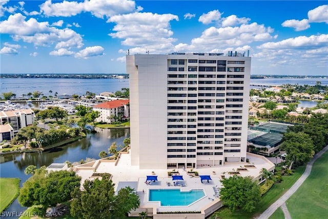 view of building exterior featuring a water view