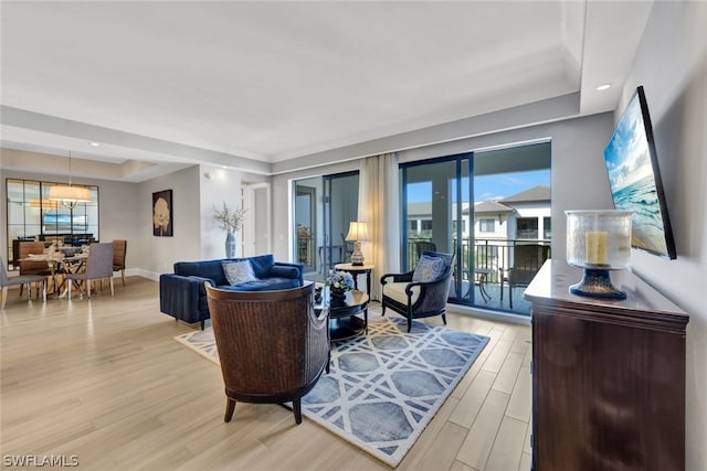 living room with light hardwood / wood-style floors