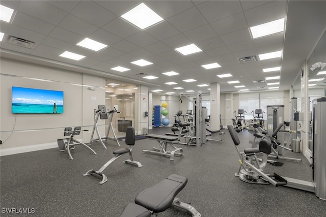 exercise room with a drop ceiling