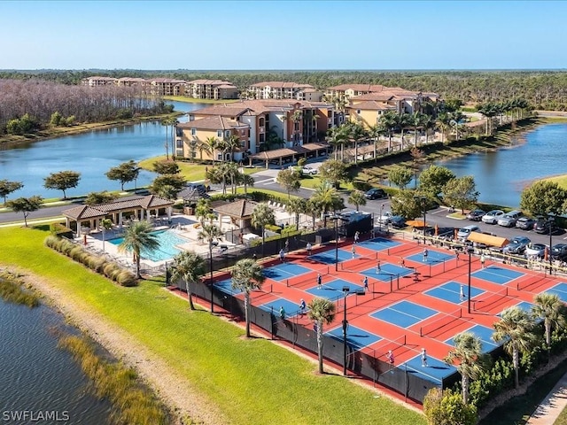 drone / aerial view with a water view