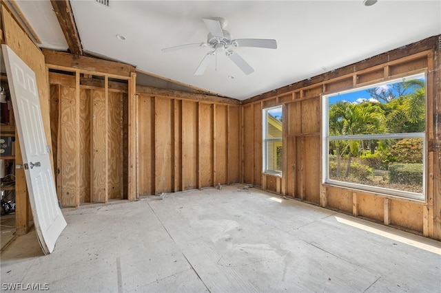 miscellaneous room with ceiling fan and vaulted ceiling