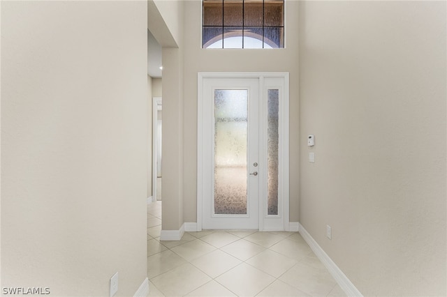 foyer with light tile floors