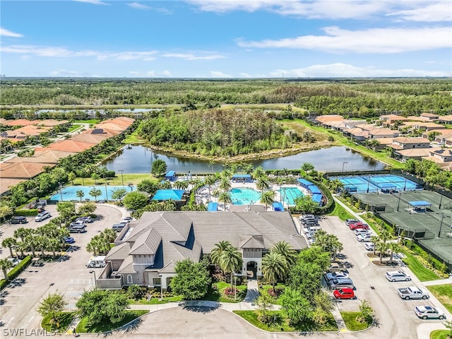 bird's eye view with a water view