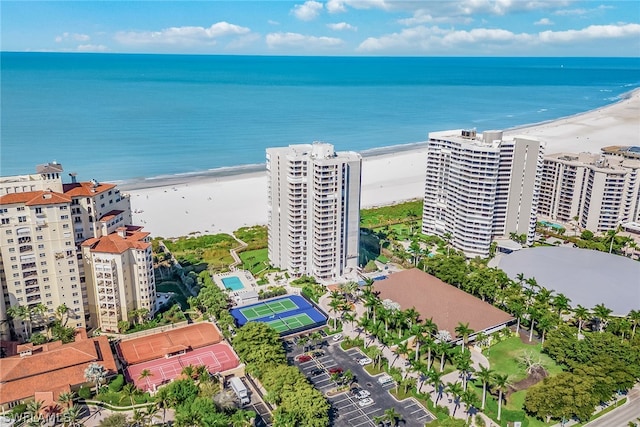 drone / aerial view with a view of the beach and a water view