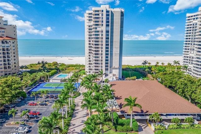 aerial view featuring a water view and a view of the beach