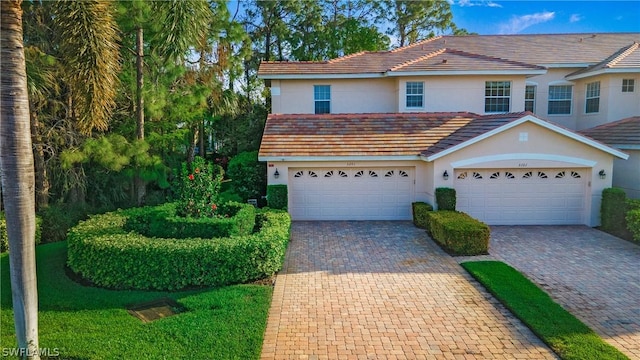 view of front of home with a garage