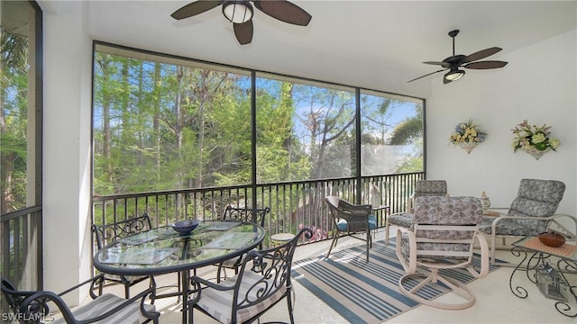 sunroom / solarium with ceiling fan