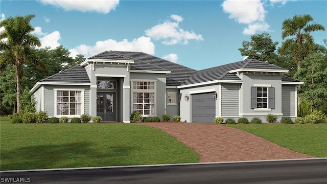 view of front facade with a front yard and a garage