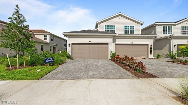 view of front of property featuring a garage