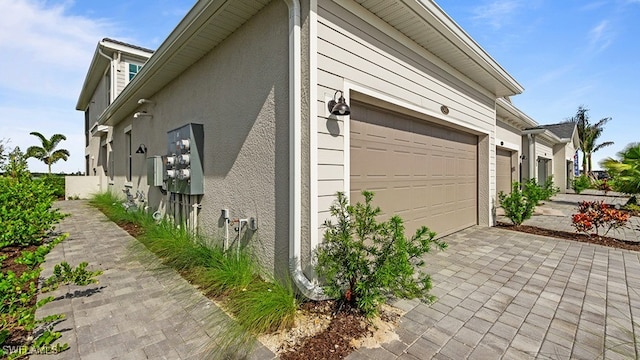 view of home's exterior with a garage