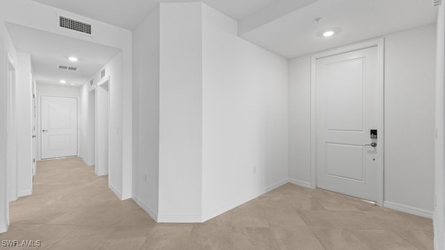 entrance foyer featuring light tile patterned floors